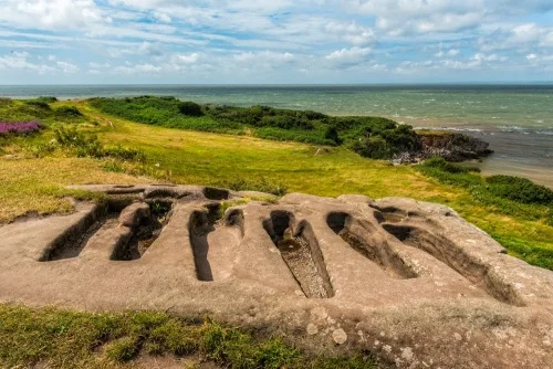 Rock-cut graves on the clifftop
