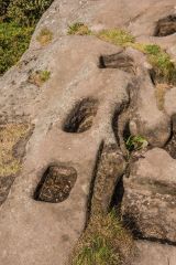 Sockets for crosses above the graves