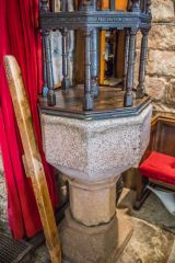 The 15th-century font and Jacobean cover