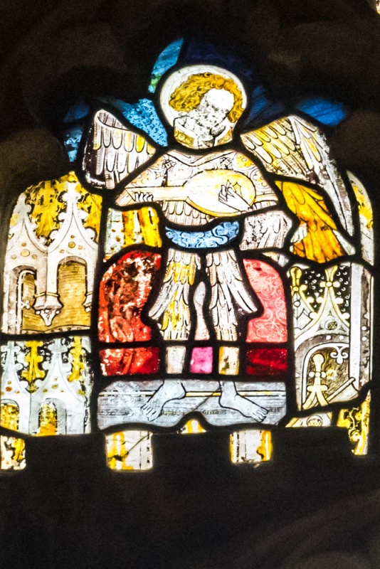 15th century glass of an angel playing a rebec