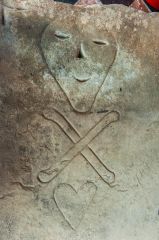 Momento mori carving on a 17th century grave slab