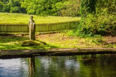 Holystone Lady's Well, Statue of St Paulinus reflected in the pool