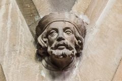 Caveed head on the nave arcade