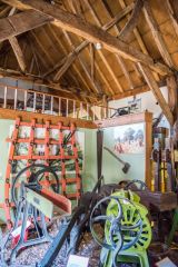 Agricultural implements in the historic barn