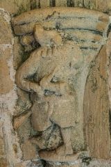 Carving of a musician, south porch