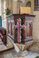 The Jacobean pulpit on its medieval base