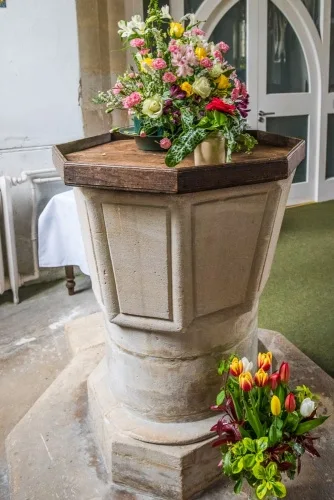 The Norman font and Jacobean cover