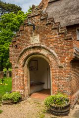 The gabled south porch