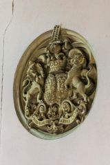A beautifully carved royal coat of arms