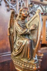 A beautifully carved bench end