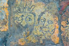 Human heads in the 14th century floor tiles