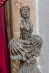 15th century poppyhead bench end