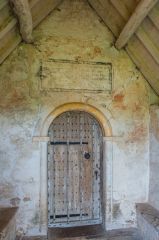 Wall paintings over the south door