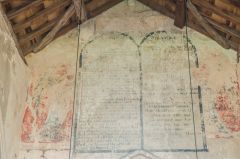 Painted decalogue over the chancel arch