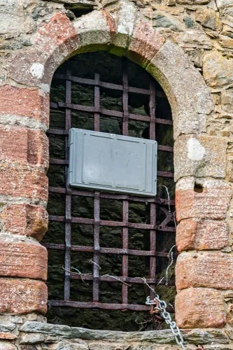 The first-floor entrance and iron yett