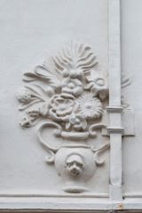 Pargeting depicting a vase of flowers