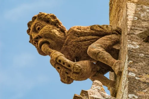 Hunky punk figure of a bagpiper