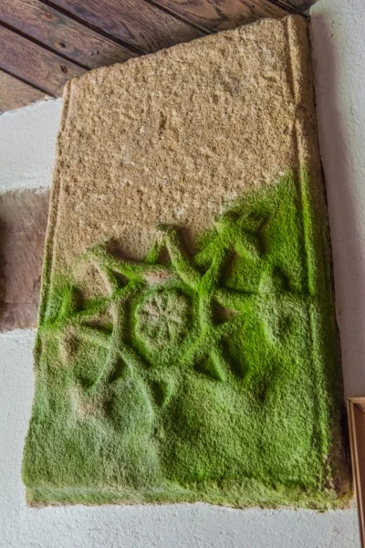 Medieval grave slab in the porch