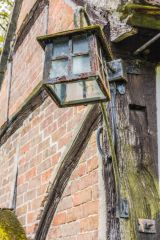 A lantern hanging outside the Priest's House