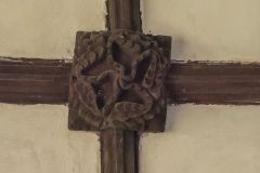 An ornately carved roof boss