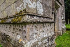 Ornate decorative carving frieze on the tower