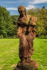 A neoclassical statue in the grounds