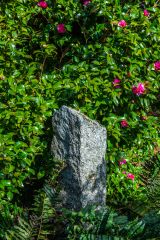 A stone pillar adds interest