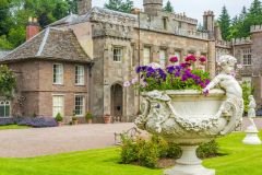 A garden urn in front of Kentchurch Court