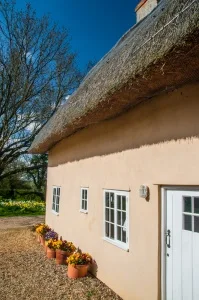 A pretty thatched cottage on Church Road