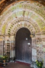 The beautifully carved south doorway arch