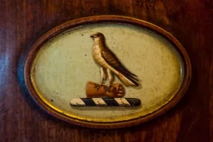 Acland crest on entrance hall chair