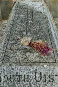 A faded bouquet on Flora Macdonald's grave