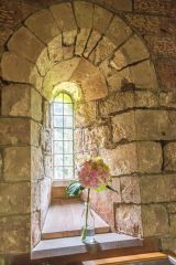 A 12th century lancet window in the north wall