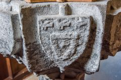 Medieval coat of arms on the font