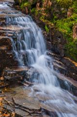 A waterfall beside the trail