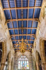 The nave roof and 17th-century chandelier