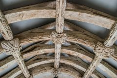 Carved roof bosses in the 15th century porch