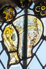 Medieval glass depicting St Etheldreda of Ely