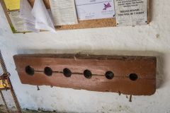 The old village stocks in the porch