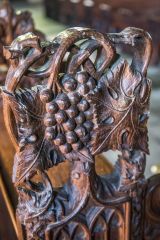 Ornately carved medieval bench end