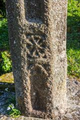 Carving on the base of the churchyard cross