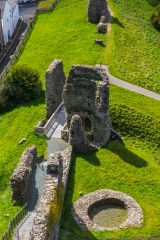 Looking down on the castle gateway and well