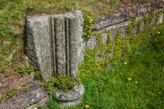 A short section of a carved pillar