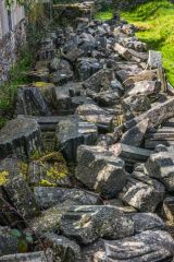 A jumble of carved stones unearthed during excavation work