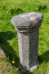 A carved granite pillar in the chancel
