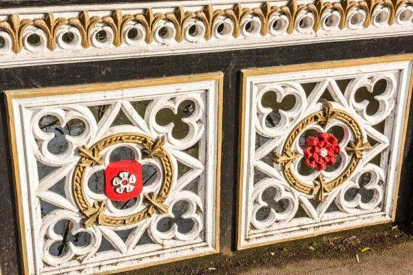 White and red roses decorate the railings