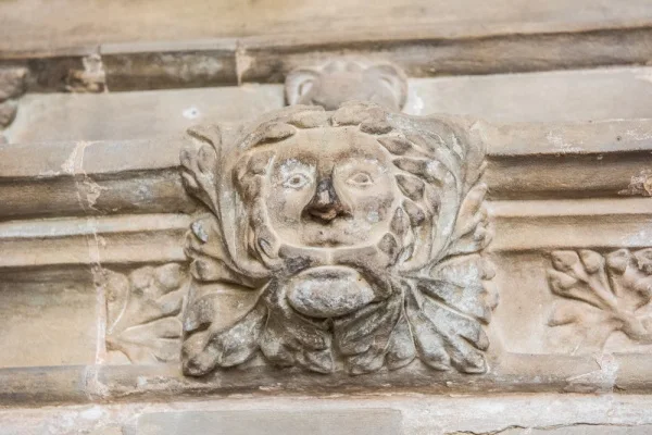 Green Man carving in the chancel