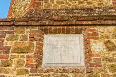 Dedication plaque over the Tower doorway