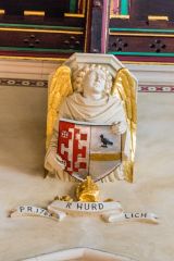 A gilded corbel head