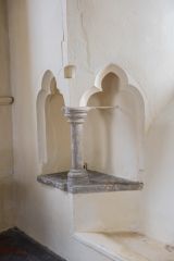 13th century angle piscina in the chancel